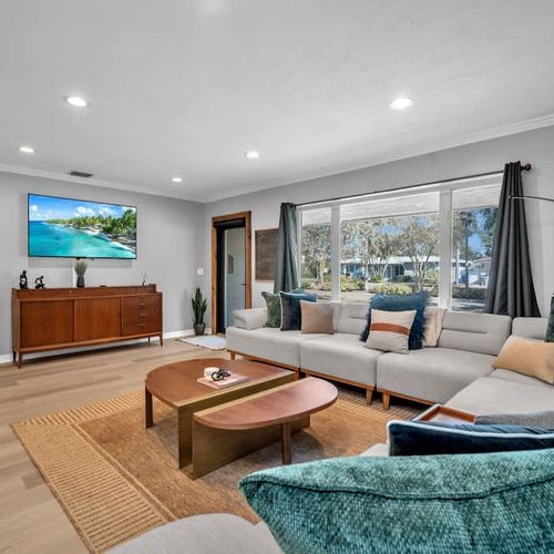 Eclectic and spacious living space with comfy seating spaces.