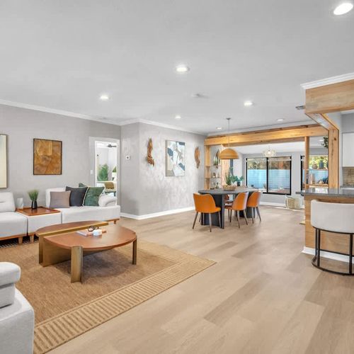 Charming and open living area, complete with relaxed seating options.
