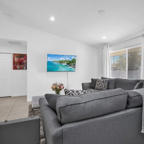 Make yourself at home in the cozy living room—watch your favorite TV shows or simply lounge on the comfortable sofa.