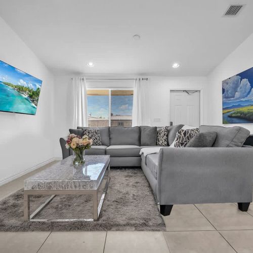 Make yourself at home in the cozy living room—watch your favorite TV shows or simply lounge on the comfortable sofa.