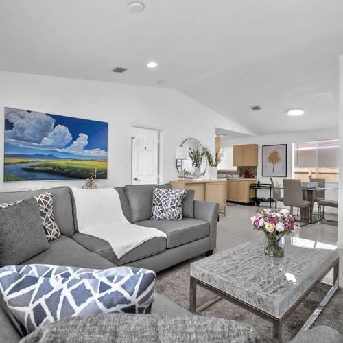 Make yourself at home in the cozy living room—watch your favorite TV shows or simply lounge on the comfortable sofa.