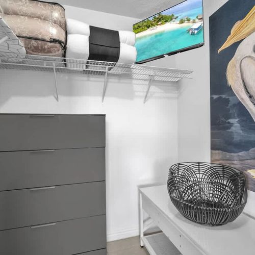 Find extra linens and towels in the storage closet for added convenience.