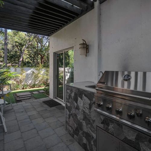 Private patio with a built-in grill—perfect for outdoor cooking and relaxation.