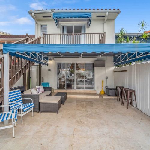 Your Private Waterfront Escape with Shaded Patio!