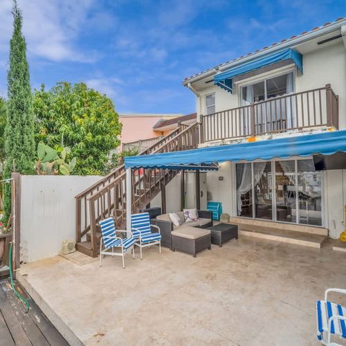Spacious patio perfect for lounging and entertaining. Enjoy the canal views and the tropical ambiance.