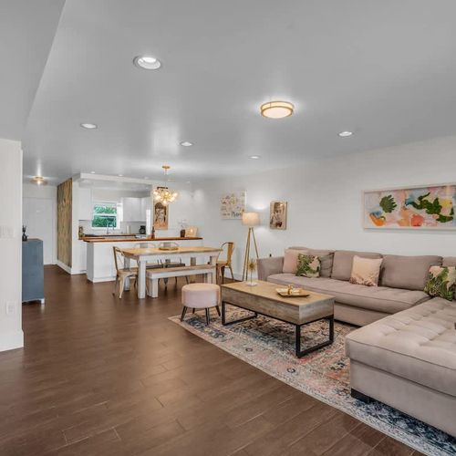 Open-concept kitchen and living area is designed for easy gatherings and laid-back comfort.