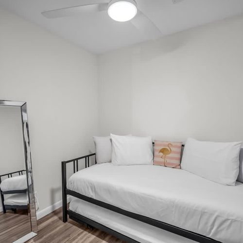 Twin bed provides extra sleeping room—ideal for guests, kids, or added comfort.