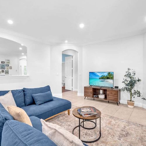 Kick back and relax in the spacious living room complete with generously sized TV to stream your must-watch list with your loved ones.