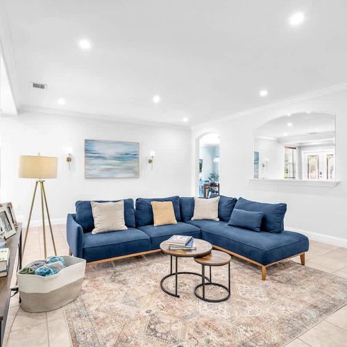 Kick back and relax in the spacious living room complete with generously sized TV to stream your must-watch list with your loved ones.