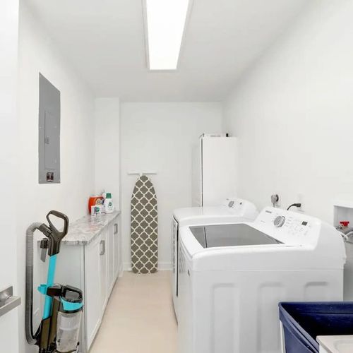 A dedicated laundry area with washer and dryer, making longer stays more comfortable.