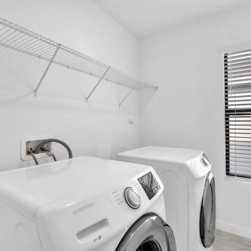 The home comes with a washer and dryer for your convenience.