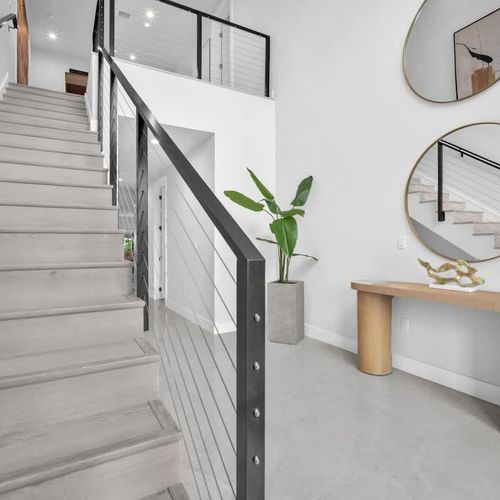 Spacious, elegant foyer offering a warm welcome the moment you step inside.