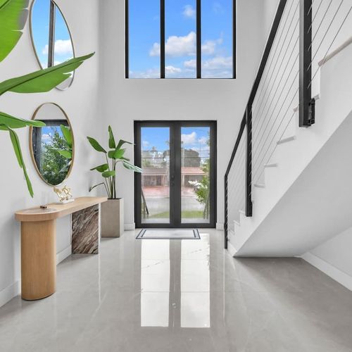 Spacious, elegant foyer offering a warm welcome the moment you step inside.