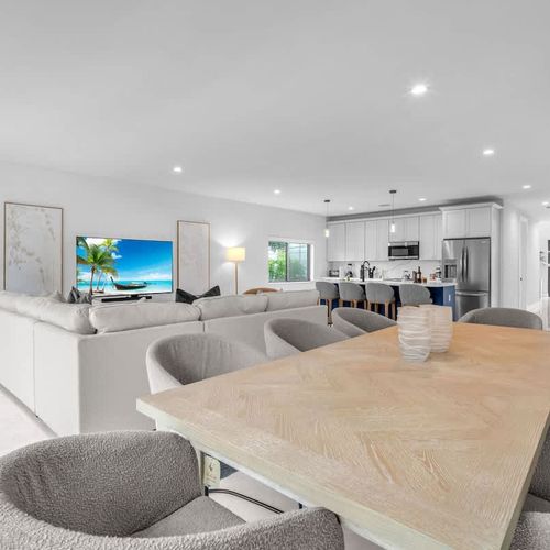 Spacious dining table with room for 8, perfect for shared meals and quality time together.