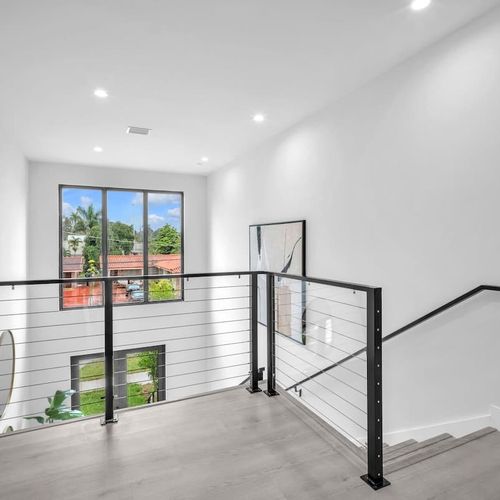 Spacious, elegant foyer offering a warm welcome the moment you step inside.