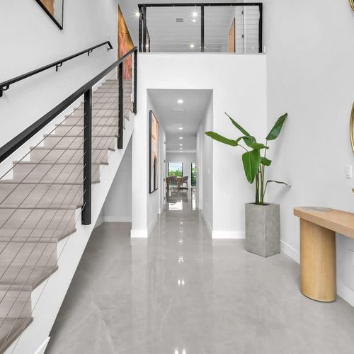 Spacious, elegant foyer offering a warm welcome the moment you step inside.