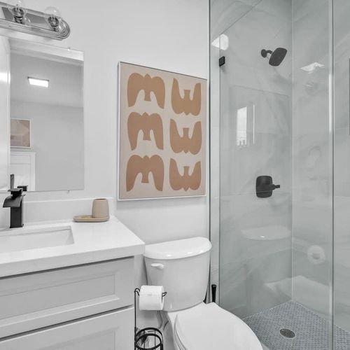 Bathroom 2, ensuite to Bedroom 4, is spotless and fully equipped with all the essentials for a comfortable stay.