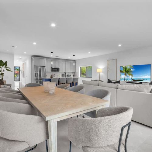 Spacious dining table with room for 8, perfect for shared meals and quality time together.