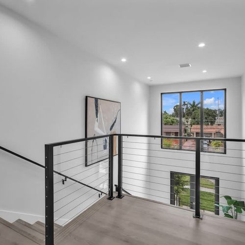 Bright and airy foyer with stylish touches to greet you and your family.