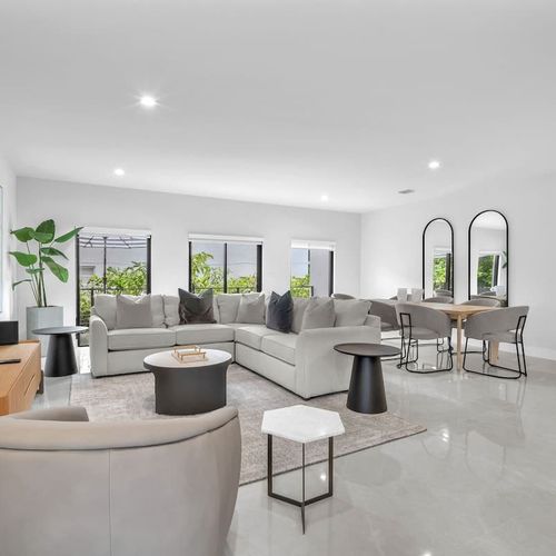 Spacious living room with a sofa bed and widescreen TV for relaxing and entertainment after a day of exploring.