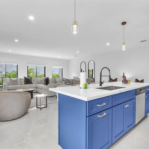 Spacious modern kitchen with a large island, plenty of storage, and all the essentials to cook your favorite meals during your stay.