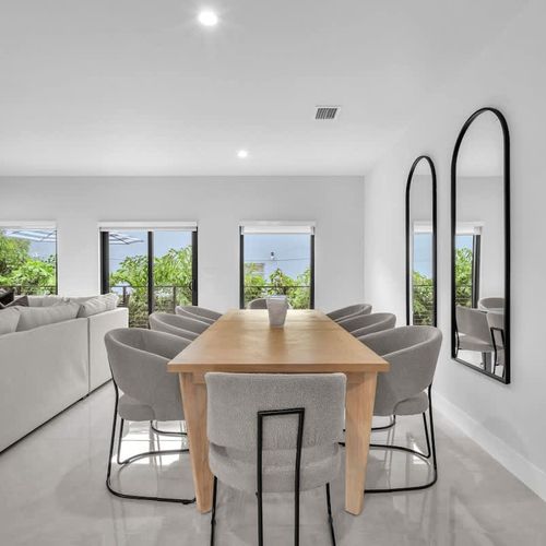 Spacious dining table with room for 8, perfect for shared meals and quality time together.