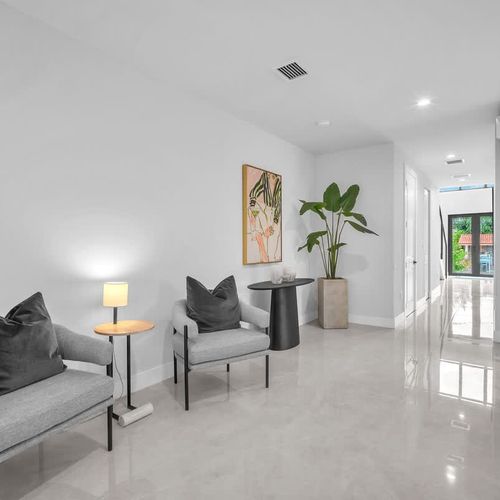 Spacious living room with a sofa bed and widescreen TV for relaxing and entertainment after a day of exploring.