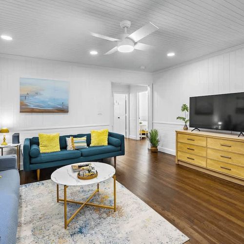 Cute and Comfortable Living Room, with a Tv with Roku streaming