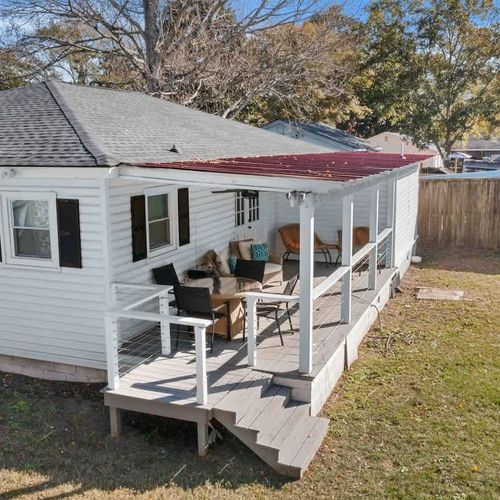 Enjoy your morning coffee, unwind with a good book, or simply relax on the back porch overlooking the peaceful private yard.