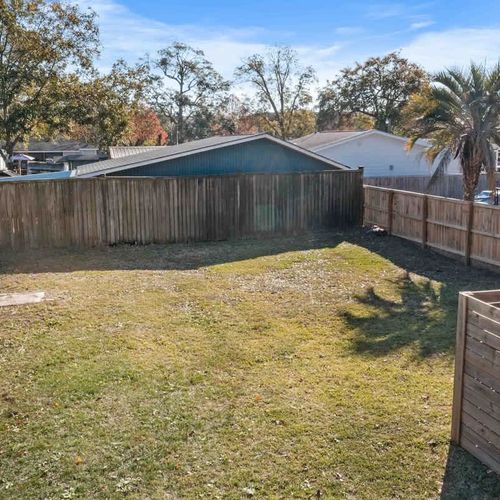 Spacious backyard ideal for guests traveling with their fur babies.