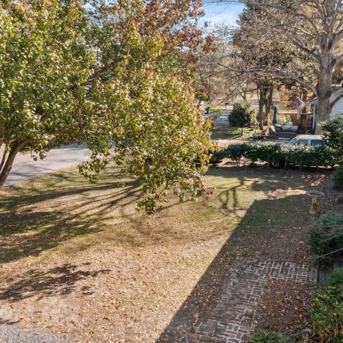 The front yard offers ample space to comfortably accommodate parking for two vehicles.