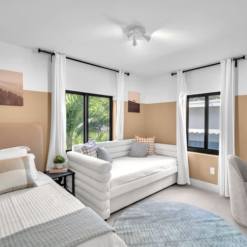 Bedroom featuring a White Twin Daybed with Trundle, perfect for additional sleeping space!