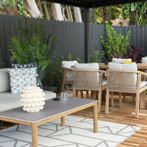 Enjoy the tropical Miami ambiance in a fully fenced backyard, complete with outdoor seating for relaxing and entertaining during your stay!