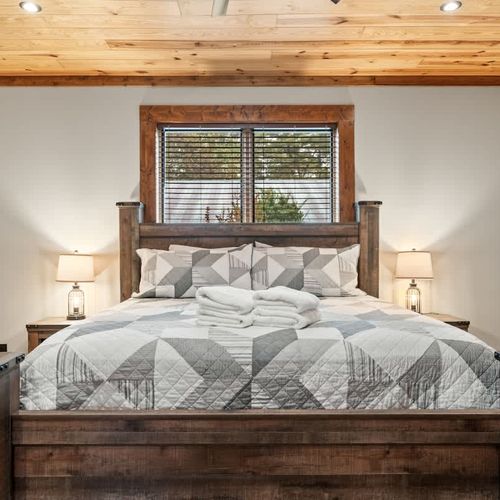 The bedrooms feature cozy, comfortable beds with fresh, crisp linens for a restful night’s sleep.