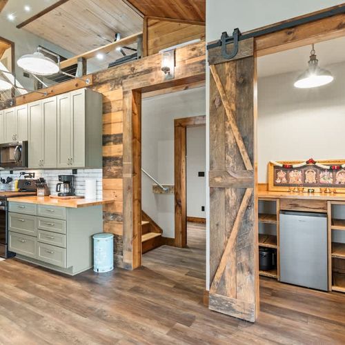 Spacious fully equipped kitchen with ample storage, stocked with all the essentials you need to prepare delicious meals for family or friends