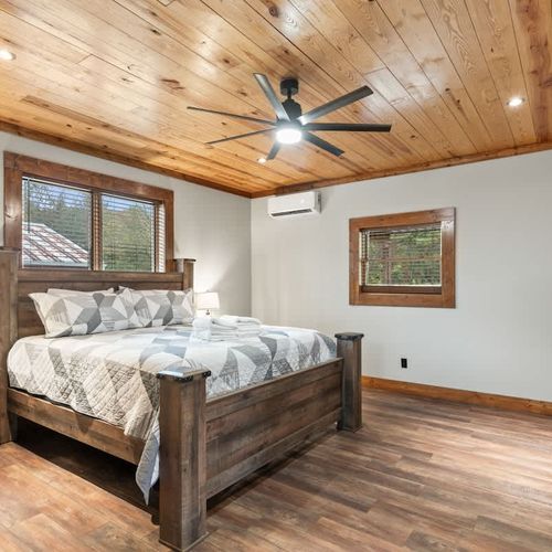 The bedrooms feature cozy, comfortable beds with fresh, crisp linens for a restful night’s sleep.