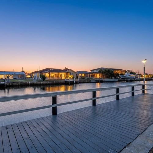 Relax each evening with serene canal views, colorful sunsets, and a clear night sky.