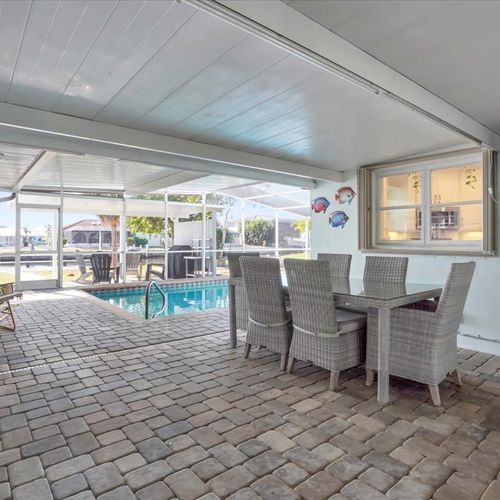 Enjoy your meals in the comfort of the dining area or by the pool.