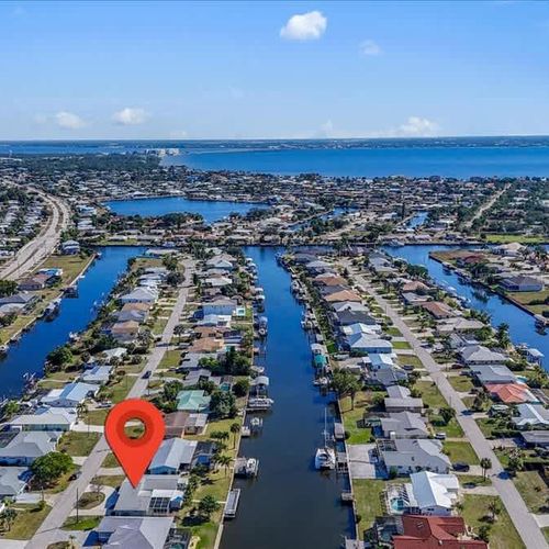 Experience the charm of this waterfront Port Charlotte home, perfectly situated for tranquility, water views, and outdoor enjoyment.