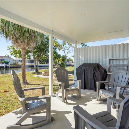 Unwind on the patio with a good book or coffee, soaking in the serene canal views.