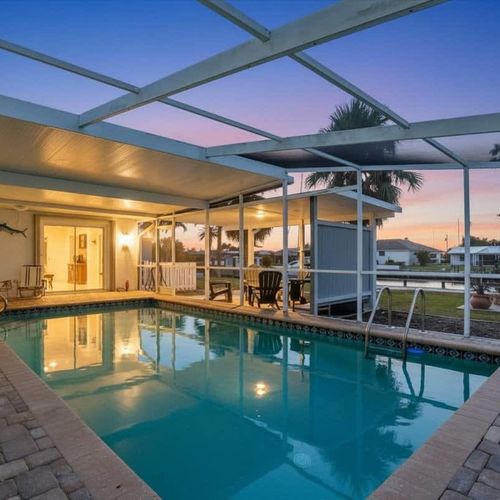 Enjoy the heated pool while soaking in tranquil canal scenery.