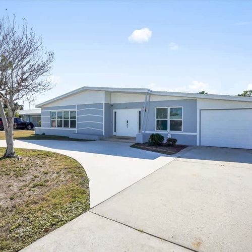 Ample driveway space with convenient free parking available on the property.