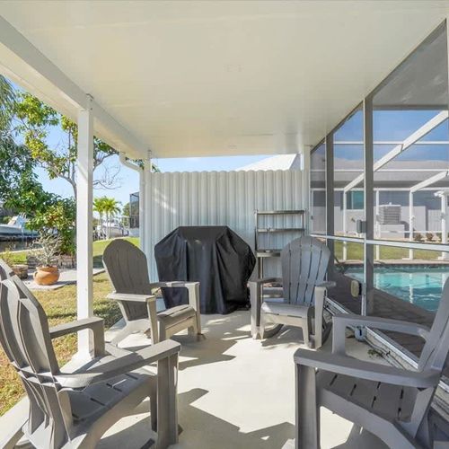 Unwind on the patio with a good book or coffee, soaking in the serene canal views.