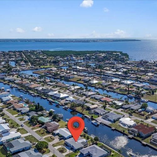 Experience the charm of this waterfront Port Charlotte home, perfectly situated for tranquility, water views, and outdoor enjoyment.
