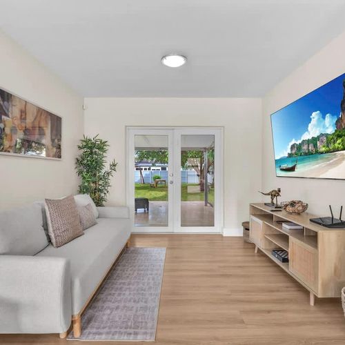 Kick back and stream your favorite movies and shows on the wide, high-definition TV.