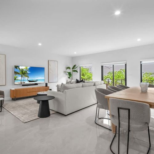 Both units have spacious living rooms with a sofa bed and widescreen TV for relaxing and entertainment after a day of exploring.