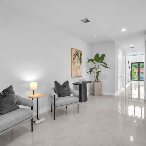 Both units have spacious living rooms with a sofa bed and widescreen TV for relaxing and entertainment after a day of exploring.