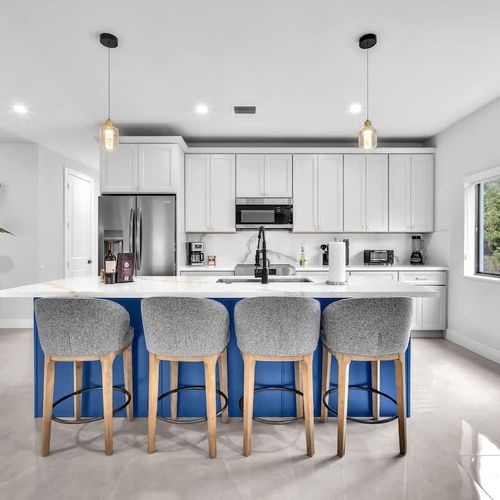 Both units feature spacious modern kitchen with a large island, plenty of storage, and all the essentials to cook your favorite meals during your stay.