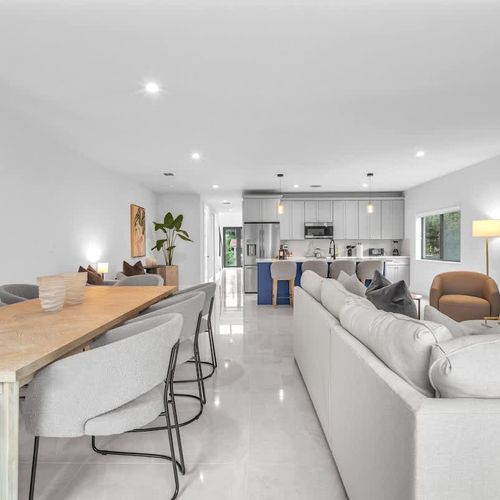 Both units have spacious living rooms with a sofa bed and widescreen TV for relaxing and entertainment after a day of exploring.