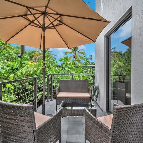 Both units have spacious balcony with outdoor seating—great for coffee, reading, or simply relaxing after a day out in South Florida.